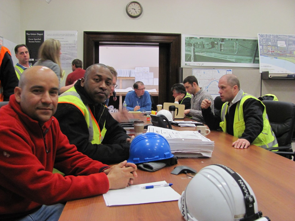 Atlas Construction & Environmental team participating in a meeting or training session