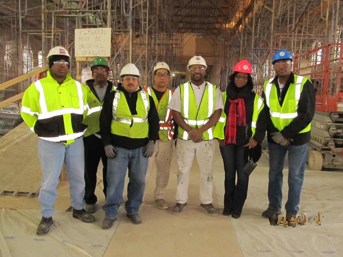 Atlas Construction & Environmental field team wearing high-visibility safety clothing