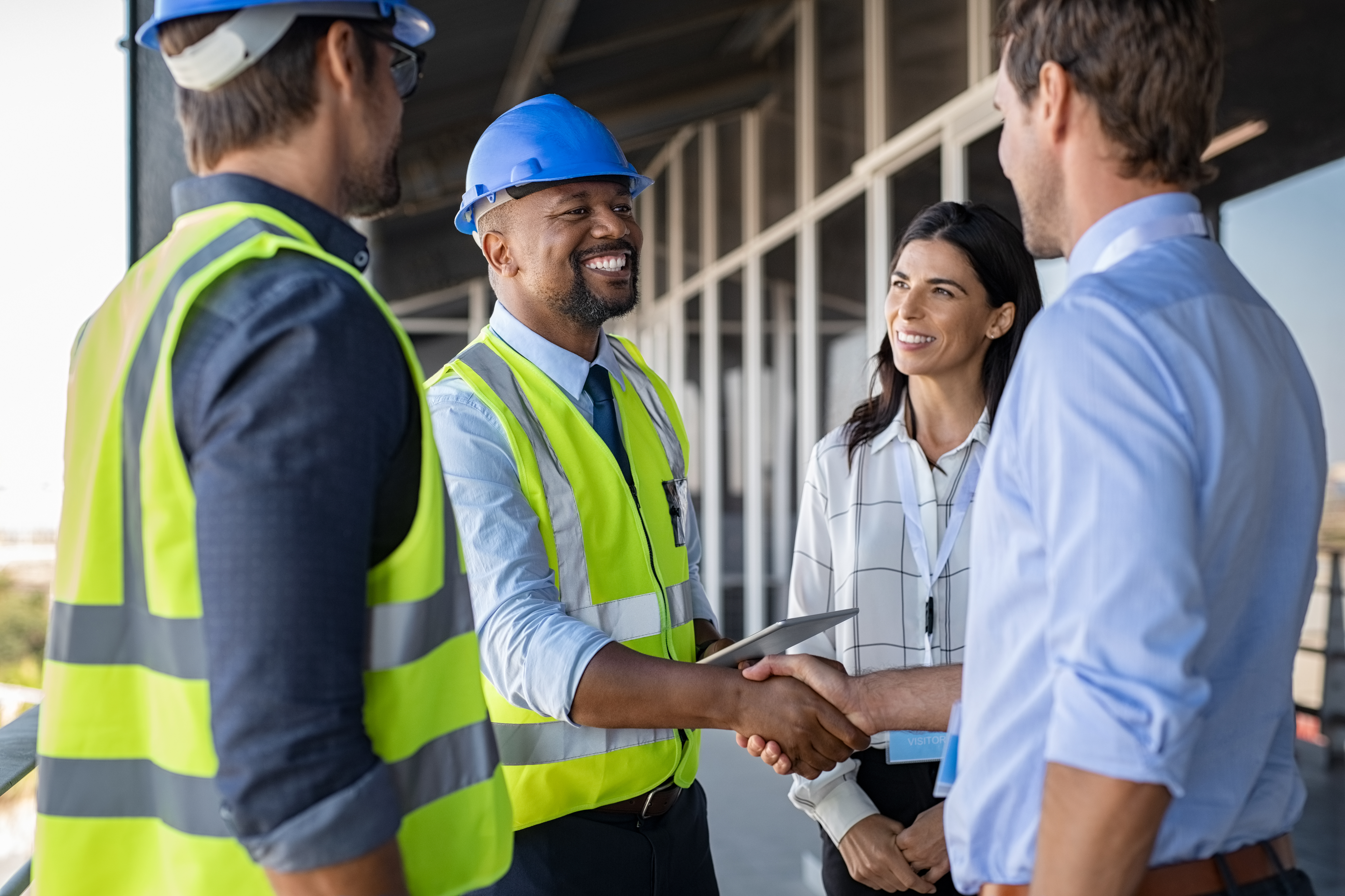 Construction and environmental professionals reviewing a project site
